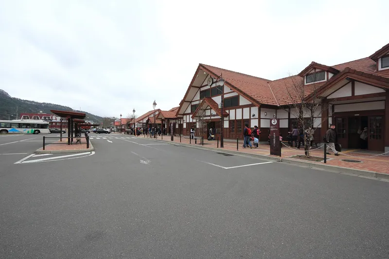 Kawaguchiko Station and bus bays on a grey day